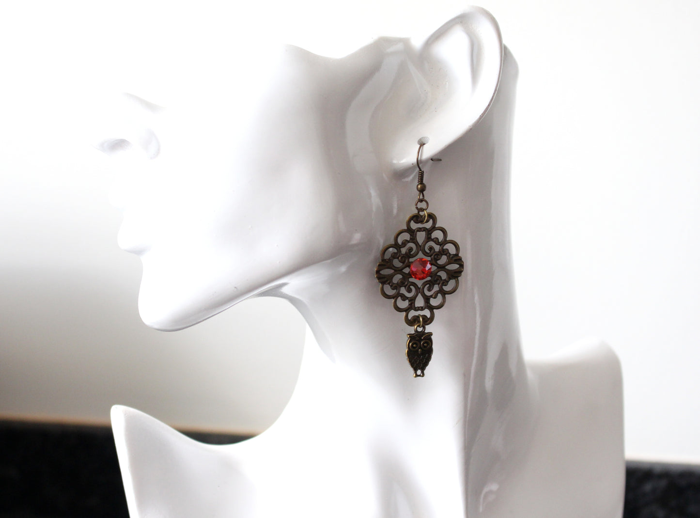 Boucles d'oreilles ajourés avec la chouette
