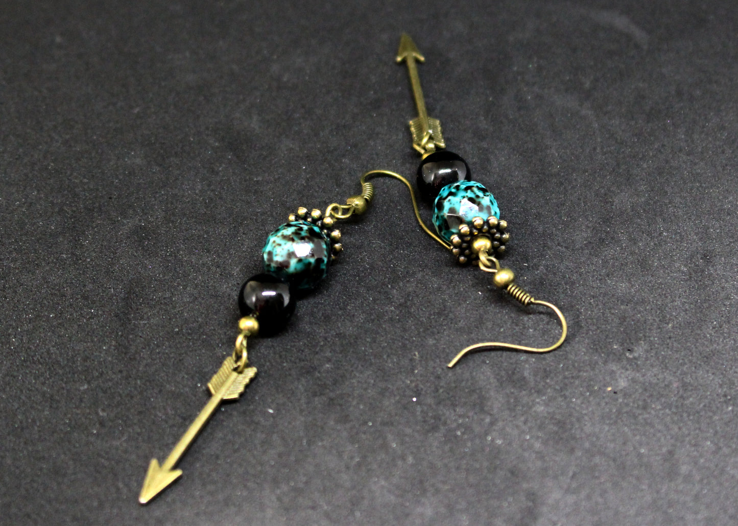 Boucles d'oreilles flèches mouchetées