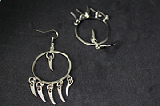 Boucles d'oreilles créoles argentées griffes